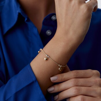 Doricalı ve Kalpli Charm Bileklik - Koşun